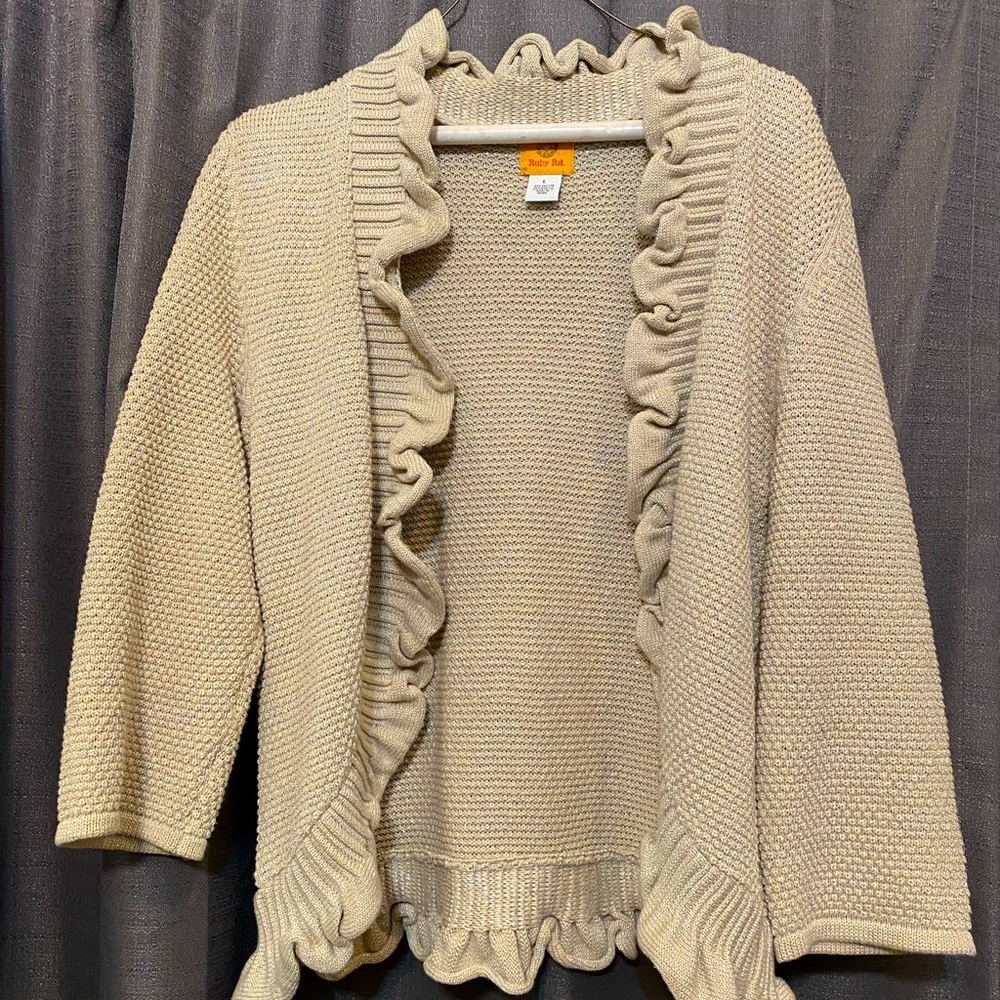 Cute ruffled sweater with gold thread throughout for a bit of sparkle
